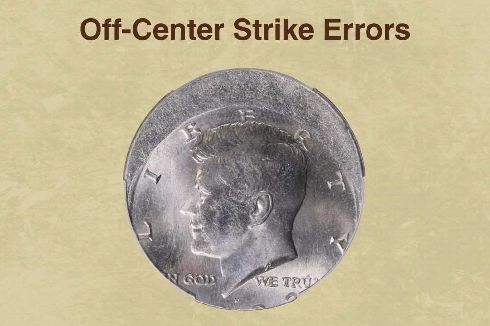 1985 Kennedy Half Dollar off-center strike error showing design shifted off-center with blank crescent along the rim