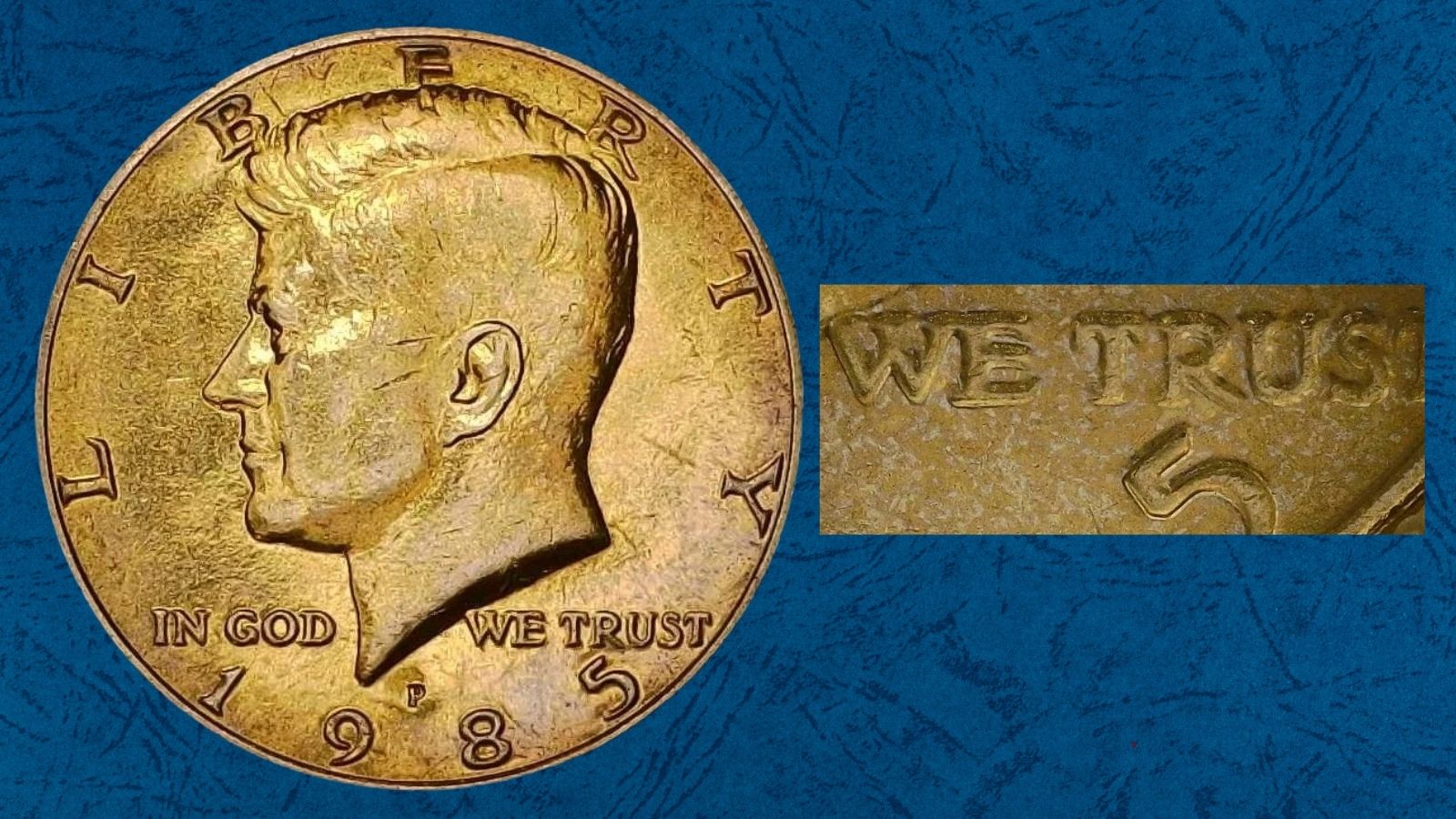 Close-up of a 1985-P Kennedy Half Dollar doubled die obverse showing doubling on IN GOD WE TRUST lettering under magnification